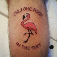 Little homemade like colored flamingo tattoo on leg with funny lettering