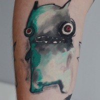 Tatuaggio curioso sul braccio Pokemon piccolo verde