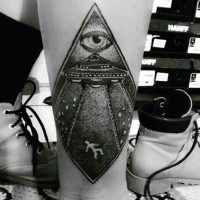 Little mystical designed black ink alien ship with human and big eye tattoo on leg
