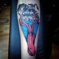 Little nautical themed colored tattoo with squid and ship on arm