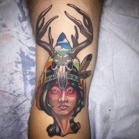 Little Old school style colored Indian woman tattoo on leg stylized with animal skull
