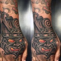 Little original colored samurai mask tattoo on hand