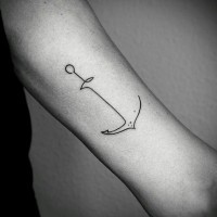 Little simple painted tiny black ink anchor tattoo on arm