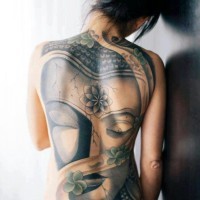 Lovely buddha tattoo on whole back for girls