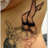 Lovely classic pin up girl tattoo on ribs
