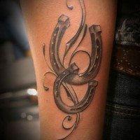 Lovely elegant two lucky horseshoe tattoo
