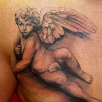 Lovely realistic cherub tattoo on chest for men