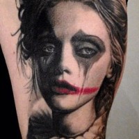 Lovely sad girl clown tattoo