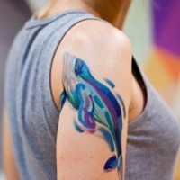 Lovely watercolor dolphin tattoo for girls