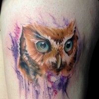 Lovely watercolor owl tattoo