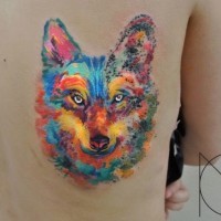 Lovely watercolor wolf tattoo on back