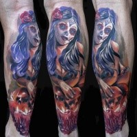 Magnificent large colored Mexican traditional style leg tattoo of woman portrait with human skulls