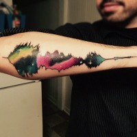 Magnificent multicolored space lie music wave tattoo on arm