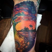 Magnificent painted multicolored wave tattoo on arm