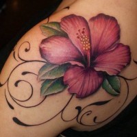 Maroon hibiscus flower tattoo on shoulder blade