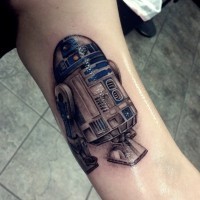 Marvelous 3D style very detailed arm tattoo of R2D2 droid