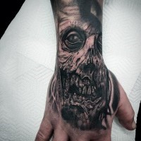 Marvelous black and white detailed horror zombie face tattoo on hand