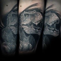 Marvelous black and white dinosaur head tattoo on forearm