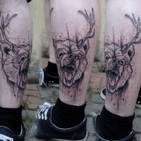 Marvelous black ink leg tattoo of bear head with deer horns