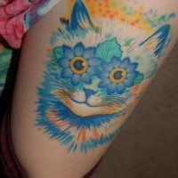 Marvelous bright colored cat with flowers eyes designed thigh tattoo