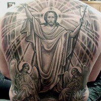 Tatuaje en la espalda, jesús brillante con ángeles tristes
