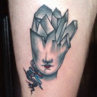 Marvelous designed and colored mystical woman tattoo on thigh