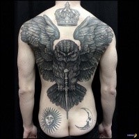 Marvelous illustrative style large mystical owl tattoo on whole back with cool dagger and crown