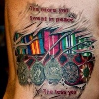 Marvelous multicolored tattoo of various medals and lettering