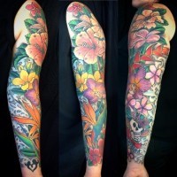 Marvelous multicolored various flowers sleeve tattoo with skull and banner lettering