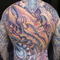 Marvelous multicolored whole back tattoo of alien skeleton