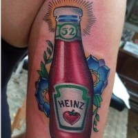 Marvelous very detailed multicolored Heinz ketchup bottle tattoo on arm stylized with flowers