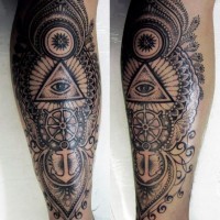 Massive black and white half nautical half masonic style detailed tattoo on leg