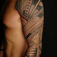 Massive black and white Polynesian ornaments tattoo on sleeve