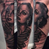 Massive black ink very realistic looking woman singer with piano keys and microphone tattoo on sleeve