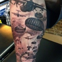 Massive colored military airborne tattoo on thigh