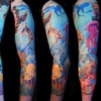 Massive multicolored underwater animals tattoo on sleeve