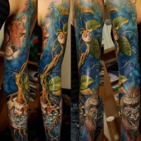 Massive natural looking very detailed various animals tattoo on sleeve with lonely plant