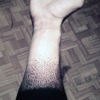 Massive simple painted black ink tribal tattoo on arm