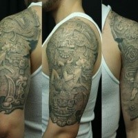 Massive stonework style shoulder tattoo of ancient wall statue