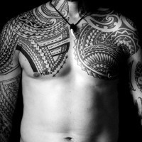 Massive very detailed various tribal ornaments tattoo on sleeve and chest