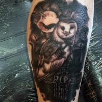 Master like painted black and white leg tattoo of creepy owl on cemetery tattoo with lettering