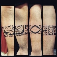 Mayan style black ink arm tattoo of ancient ornaments