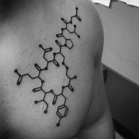 Medium size black ink chest tattoo of chemistry formula