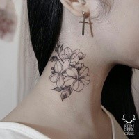 Medium size black ink neck tattoo painted by Zihwa of flowers