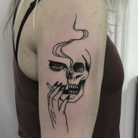 Medium size black ink shoulder tattoo of smoking woman skull