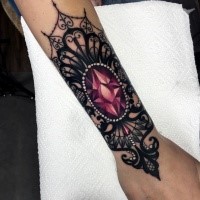 Medium size large colored by Jenna Kerr tattoo of arm band with big diamond