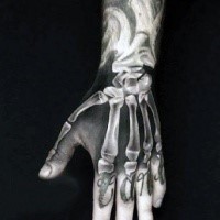Medium sized realism style X-Ray like bones tattoo on hand