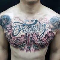 Memorial style big colored lettering with flowers tattoo on chest