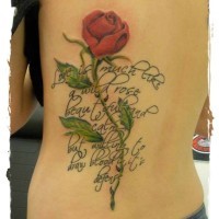 Memorial style big colored rose with lettering tattoo on back