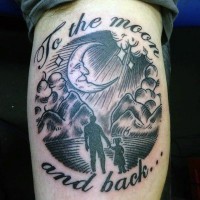 Memorial style black and white family with lettering and moon tattoo on leg